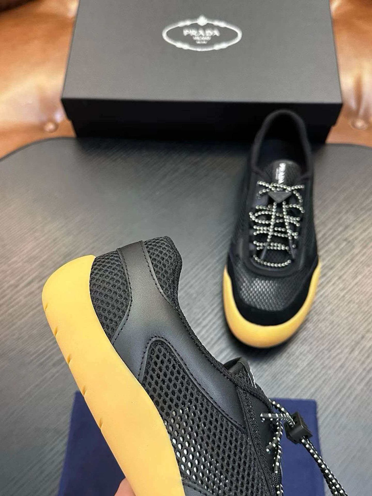 Prada Men's Black Sneakers with Yellow Sole