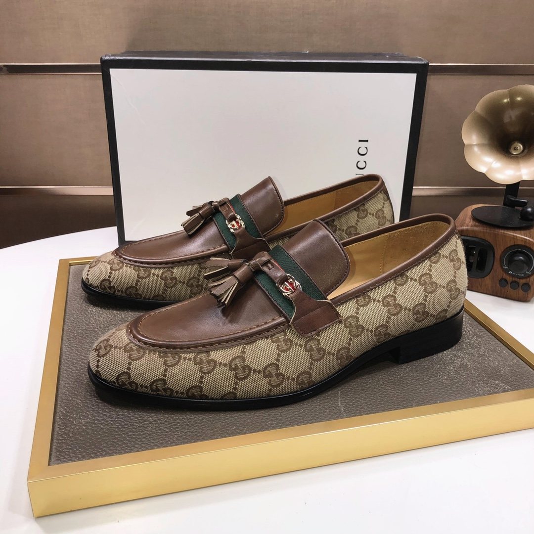 Gucci Monogram Tassel Loafers