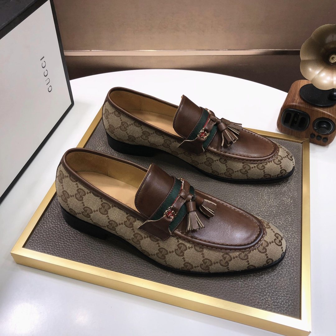 Gucci Monogram Tassel Loafers