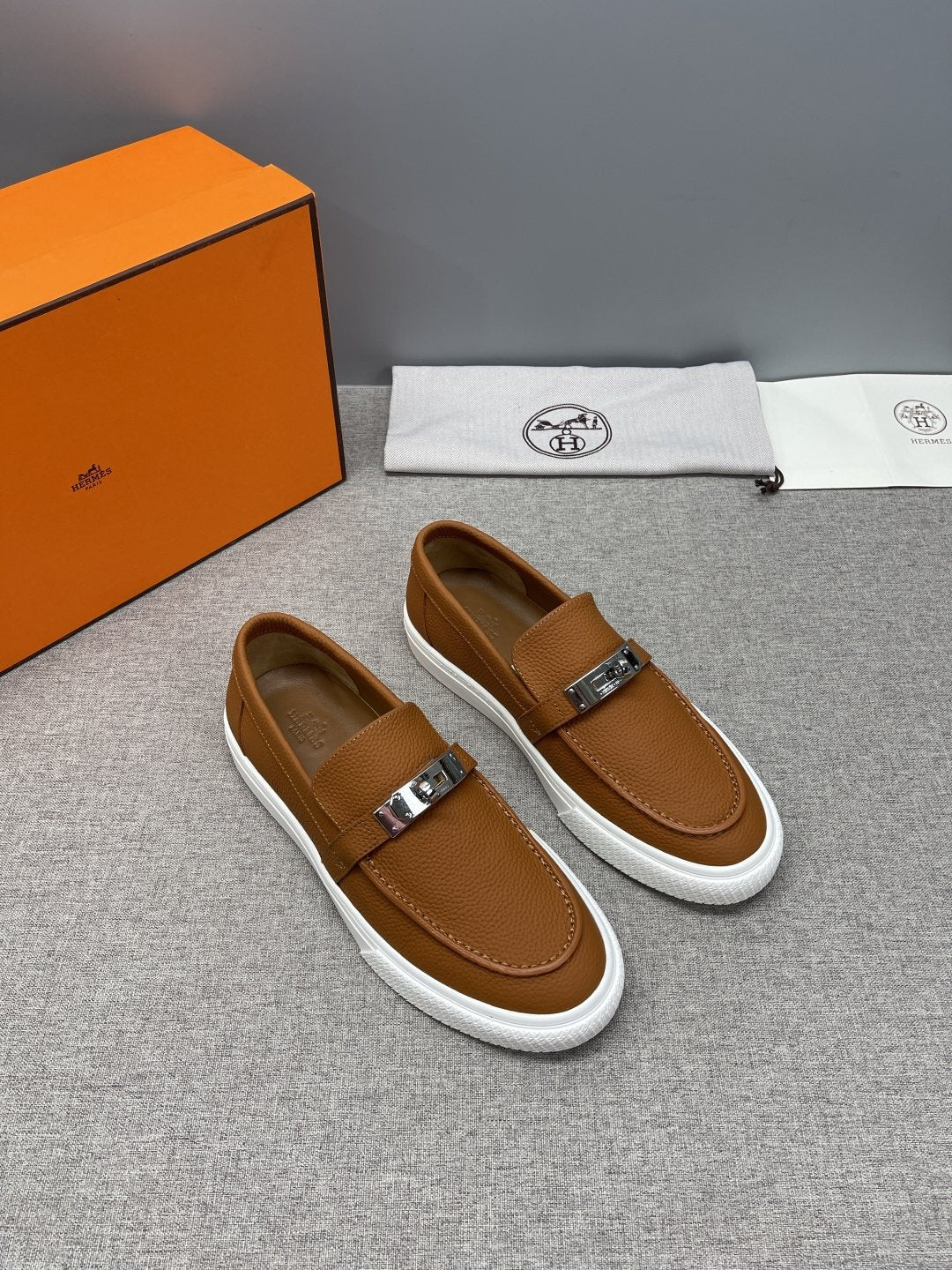 Hermès Textured Bar Loafers