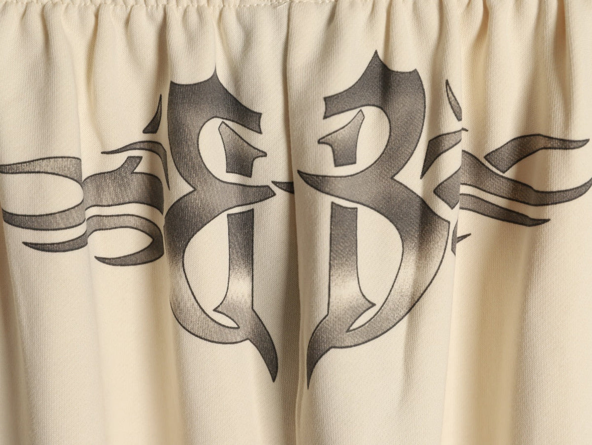 Balenciaga Tattoo-Style Graphic Wide-Leg Trousers - Cream